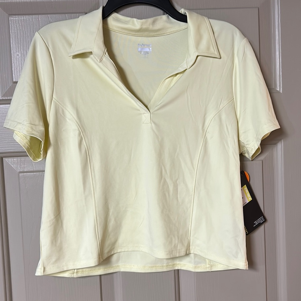 NWT- Ladies Golf shirt - very light yellow in color